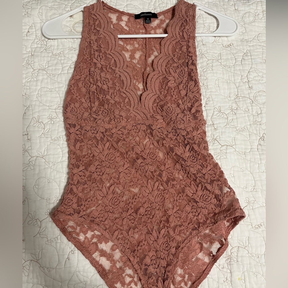 Lace pink body suit
